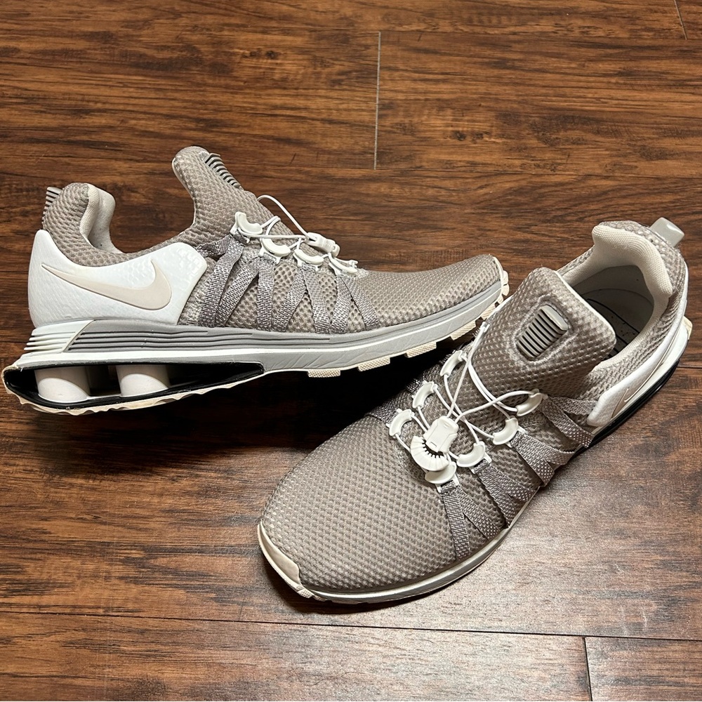 Like new (worn a handful of times) Nike shoes, white/gray in color, 9.5 in size.